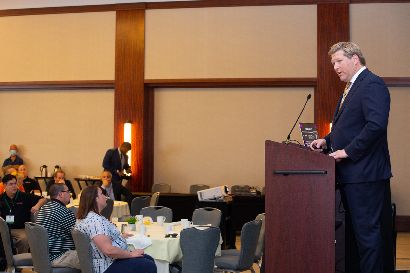 State Senate candidate Zac Haines speaking at a podium